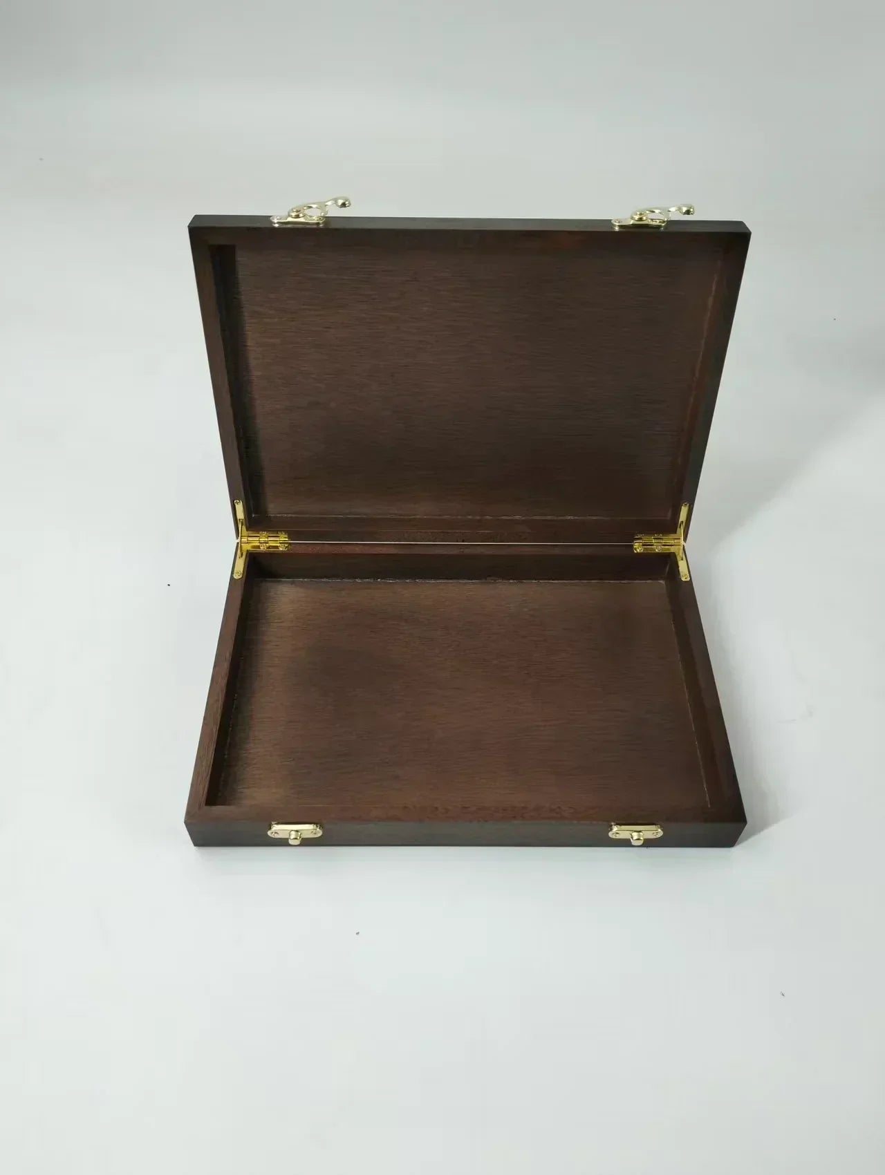Empty handcrafted mahogany archive case with a walnut finish and gold-toned brass hardware, designed for premium coin collection and display.